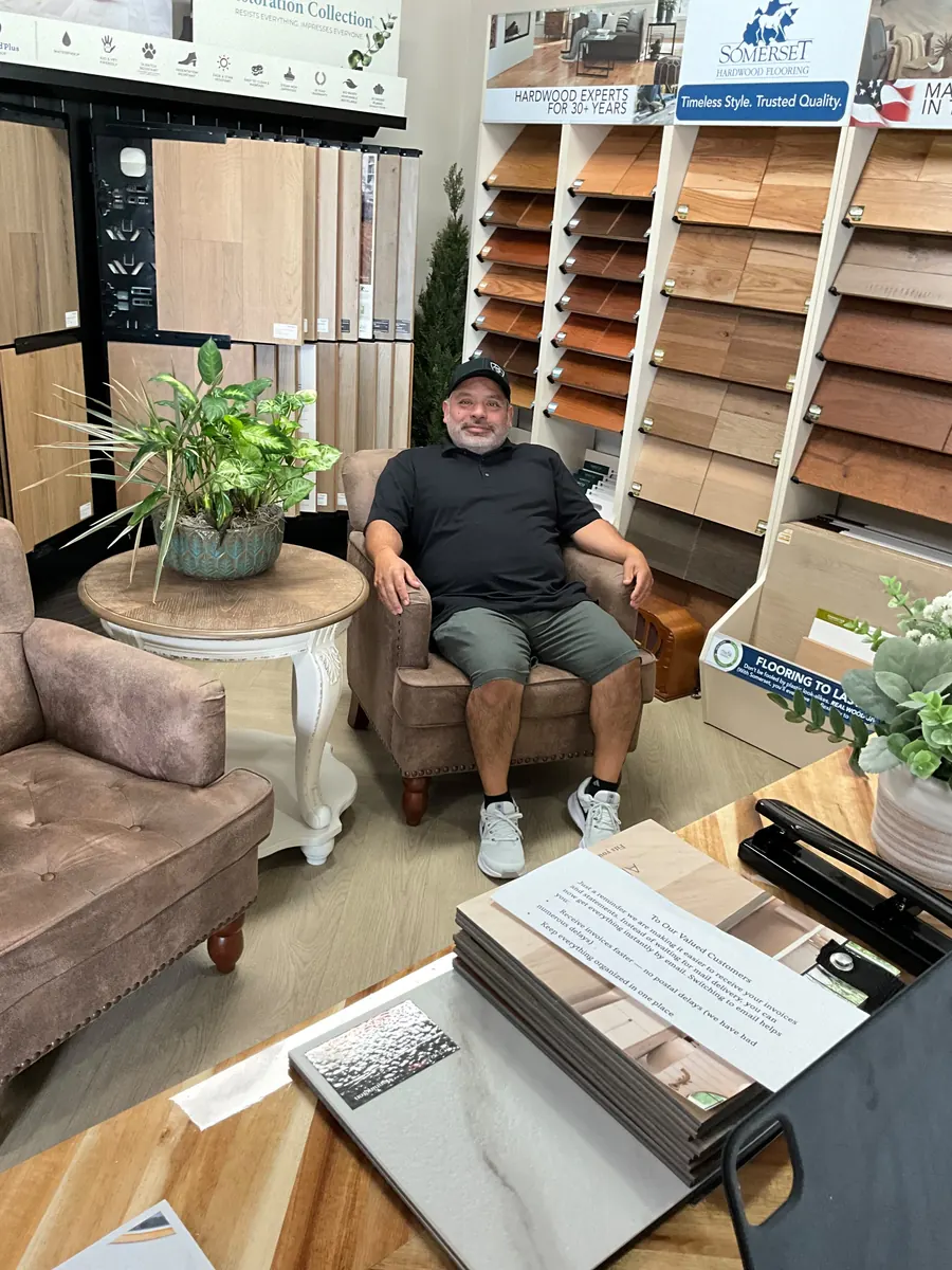 Carlos, owner of Hometown Floor Covering, in the Shelbyville showroom